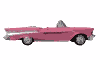 Pink 1950's car driving along a bumpy road